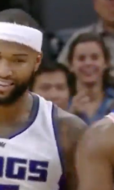 Watch DeMarcus Cousins and Joel Embiid engage in a spirited war of butt slaps